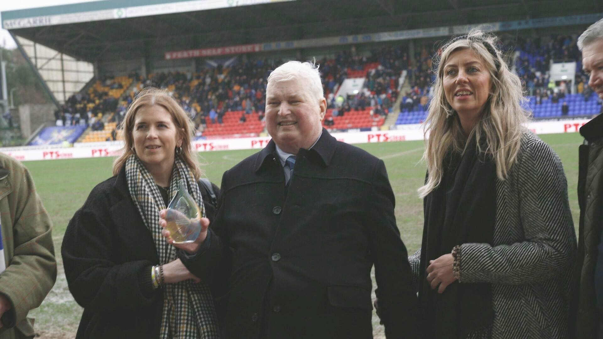 Stewart Falconer with his daughters.