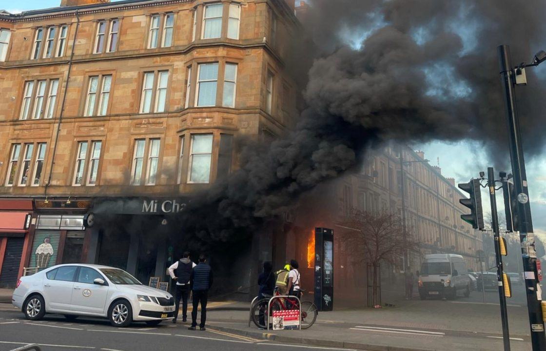 Person treated at scene after firefighters tackle blaze at café in Glasgow