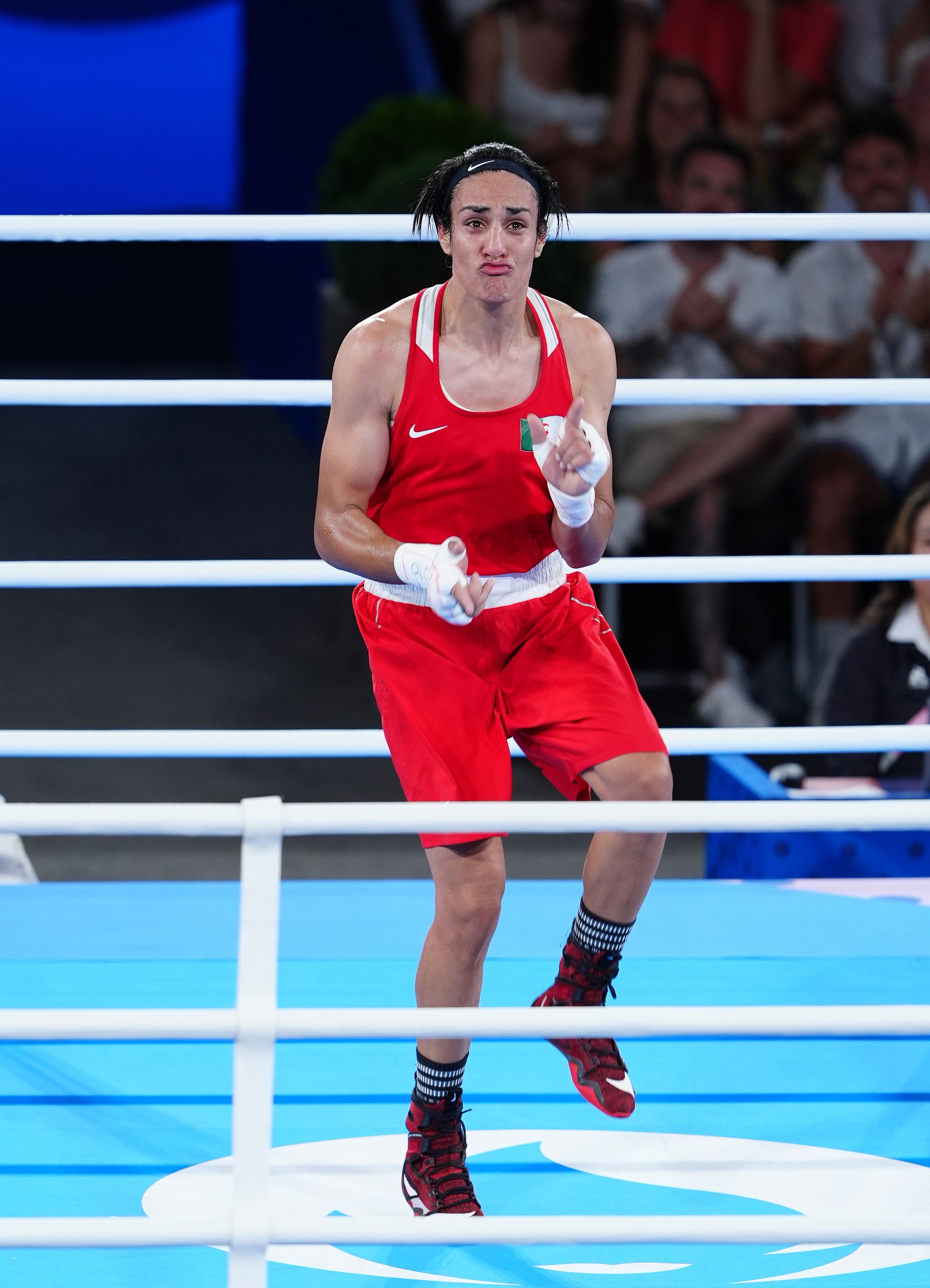 Algeria's Imane Khelif celebrates victory over China's Liu Yang (not pictured) after the Women's 66kg Final at Roland-Garros Stadium on the fourteenth day of the 2024 Paris Olympic Games in France. Picture date: Friday August 9, 2024.