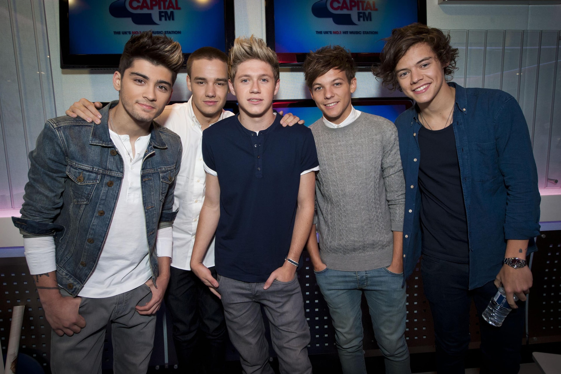 (l to r) Zayn Malik, Liam Payne, Niall Horan, Louis Tomlinson and Harry Styles pictured during an interview on Capital Breakfast with Dave Berry and Lisa Snowdon in 2012 (Yui Mok).