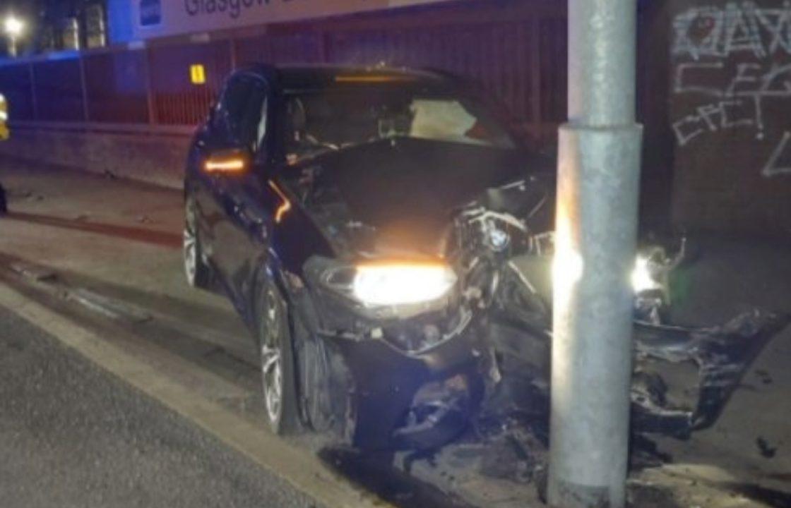 ‘Drunk driver’ charged after crashing BMW into three parked cars and lamp post