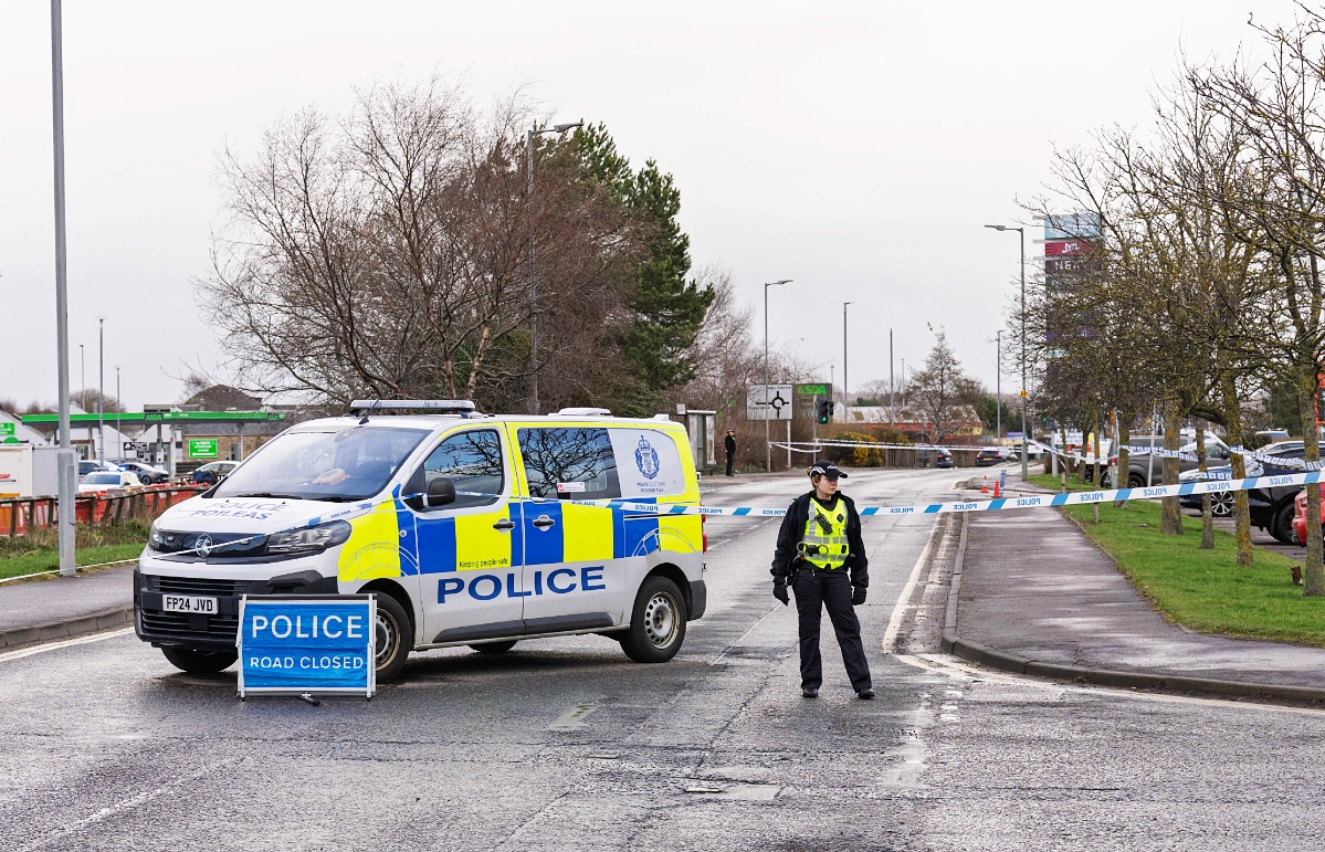 Edgar Road in Elgin at the Springfield Retail Park has been closed by police.