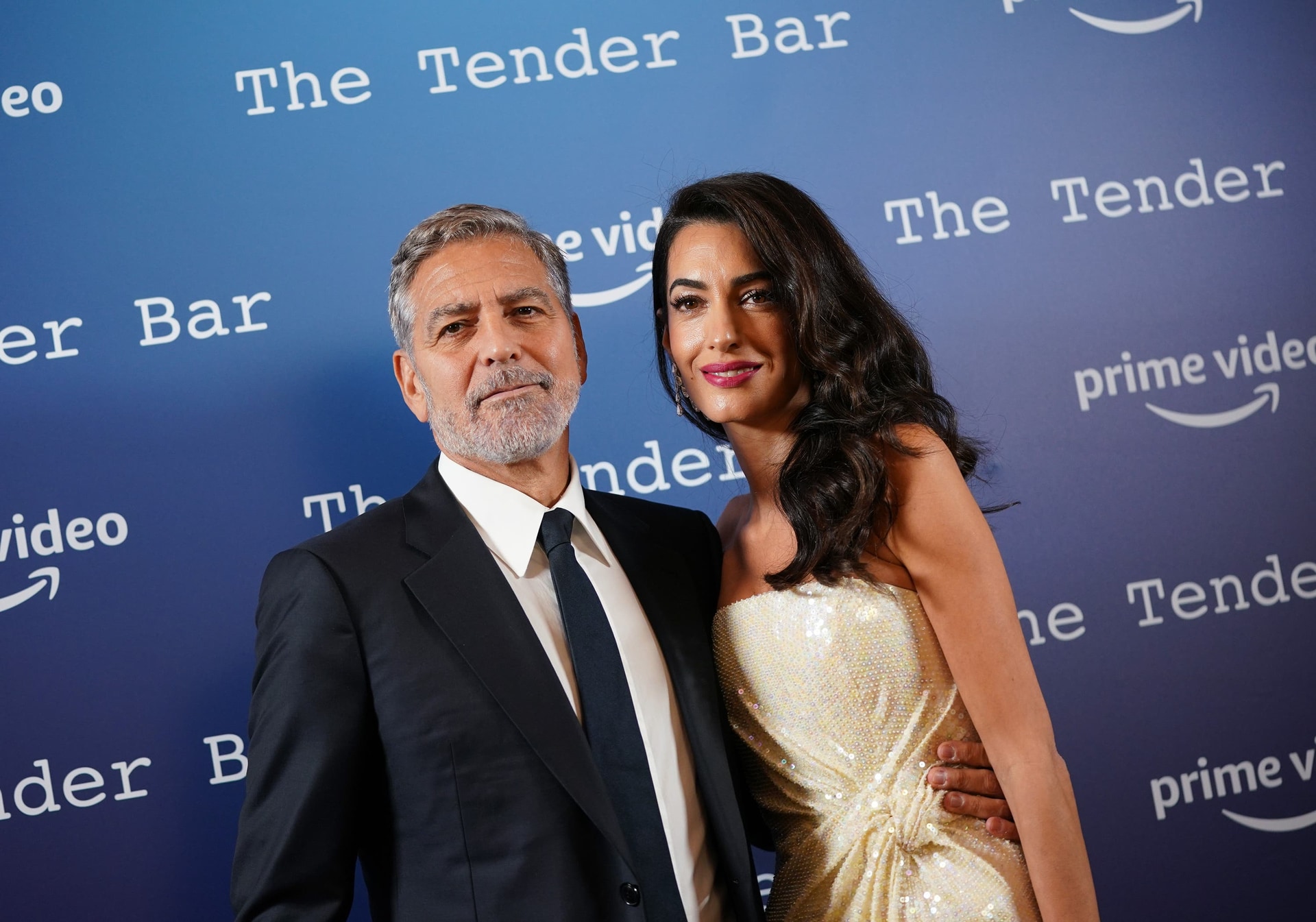 George Clooney with his wife Amal (Yui Mok/PA) 