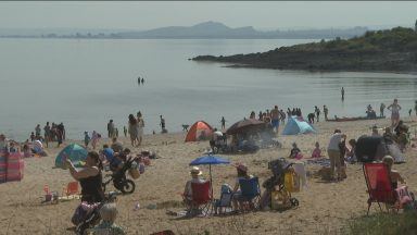 Sun seekers hit the beach as Scotland sees hottest day of the year