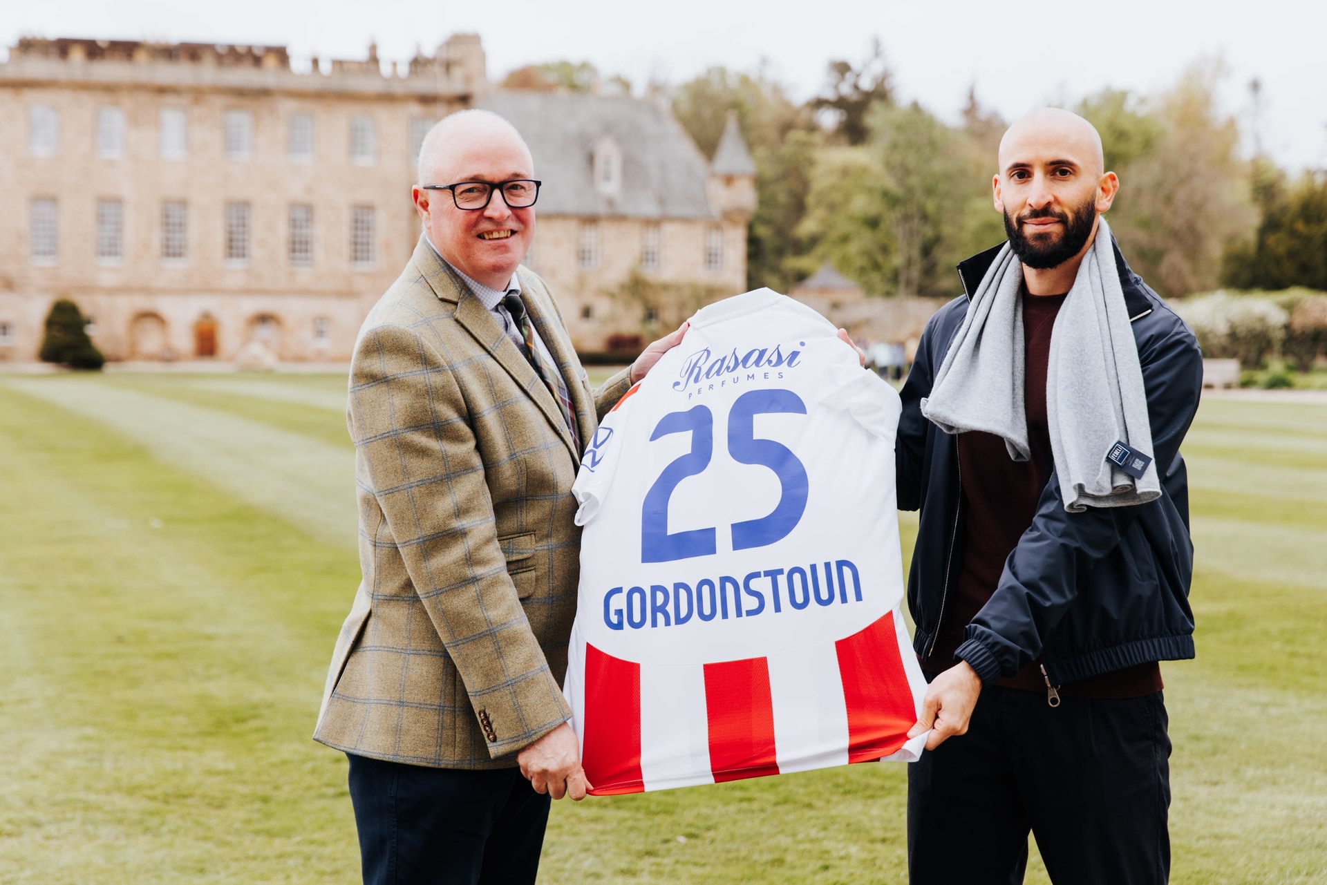 Gordonstoun Principal, Peter Green, with Gulf United FC director, Mohamed Al Rais, a former pupil at the school