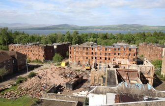 Two men hit by falling masonry during demolition work at Clune Park