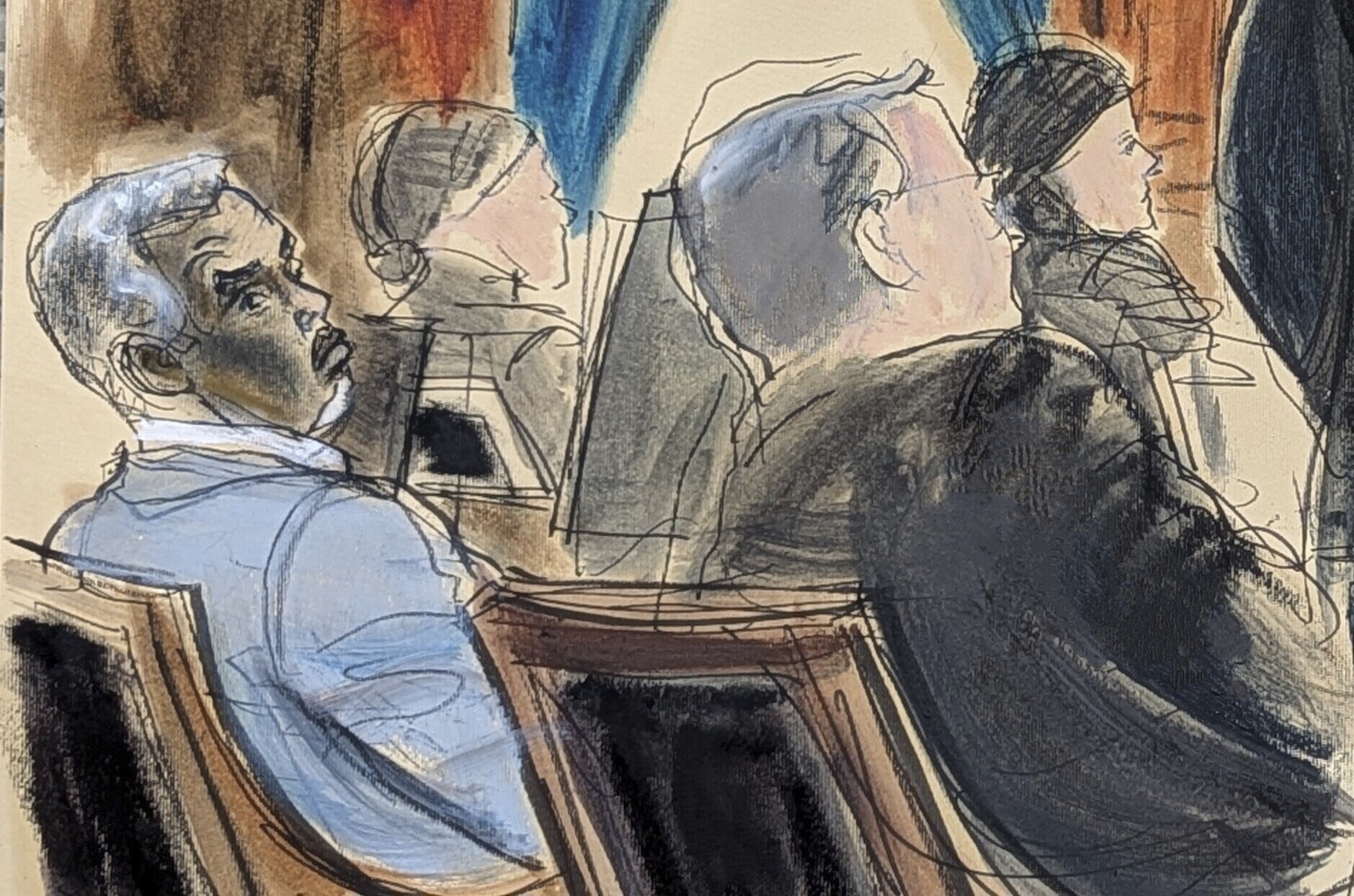 Sean ‘Diddy’ Combs, far left, and lawyer Marc Agnifilo, right, sit at the defence table in Manhattan federal court in New York.