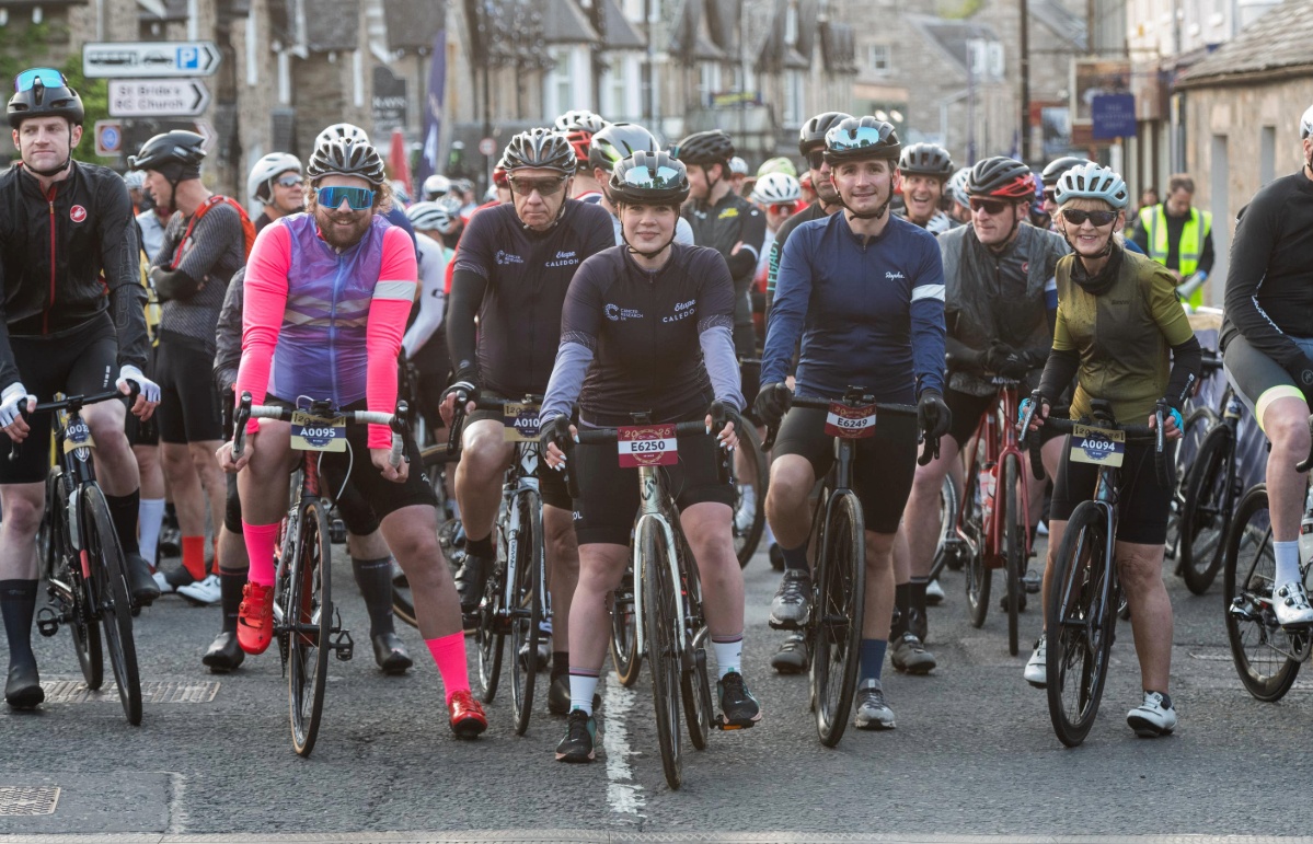 Gold medal holder and Olympian Hailey Duff MBE (front centre) skipped to the start line of Cancer Research UK Etape Caledonia to lead the pack of around 5,000 cyclists (Alan Richardson/PA)