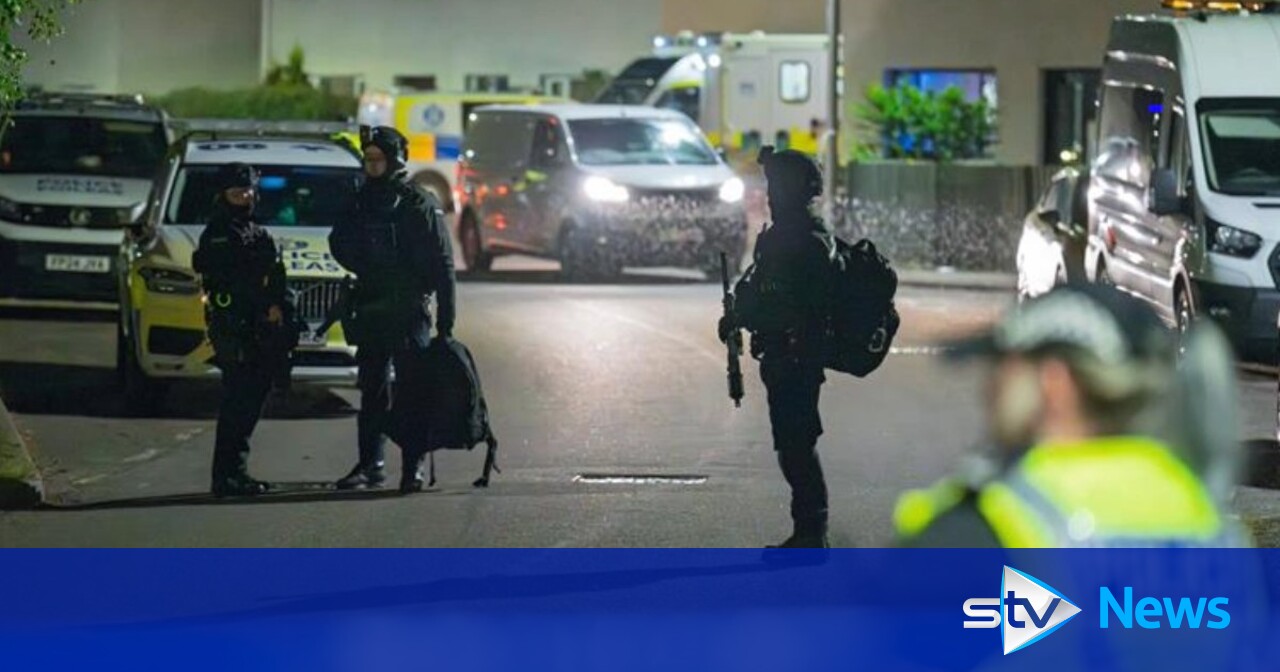 Man arrested after armed police lock down street in Moray | STV News