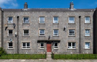 Denis Law honoured with commemorative plaque at birthplace in Aberdeen