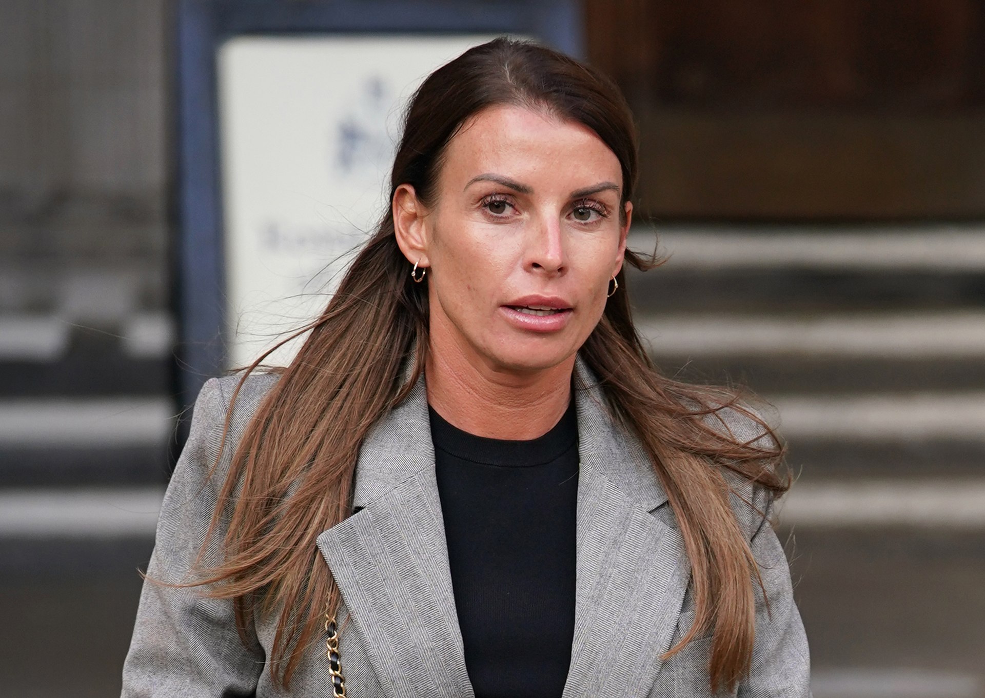Coleen Rooney leaving the Royal Courts of Justice during the trial.