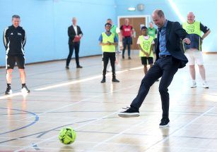 Prince William shows of football skills with Street Soccer Scotland