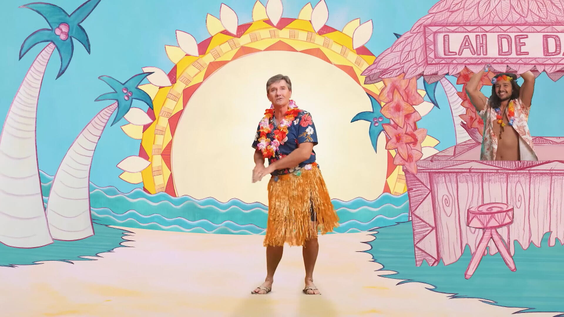 Daniel in happy-go-lucky music video for Down At the La De Da