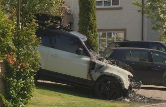 Hunt for three suspects after two cars deliberately set on fire in Edinburgh