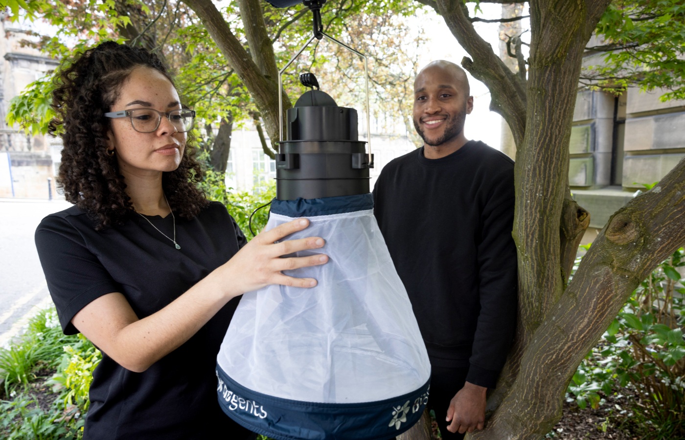 University of Glasgow researchers launching a citizen science tool to research mosquitos in Scotland. From L to R Dr Georgia Kirby and PhD student Meshach Lee with the mosquito trap.