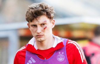 Man appears in court after Aberdeen defender Jack MacKenzie hit by seat