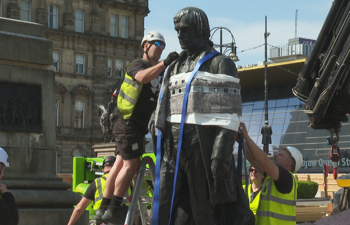 A statue of Robert Burns is the first to be removed from Glasgow's George Square.