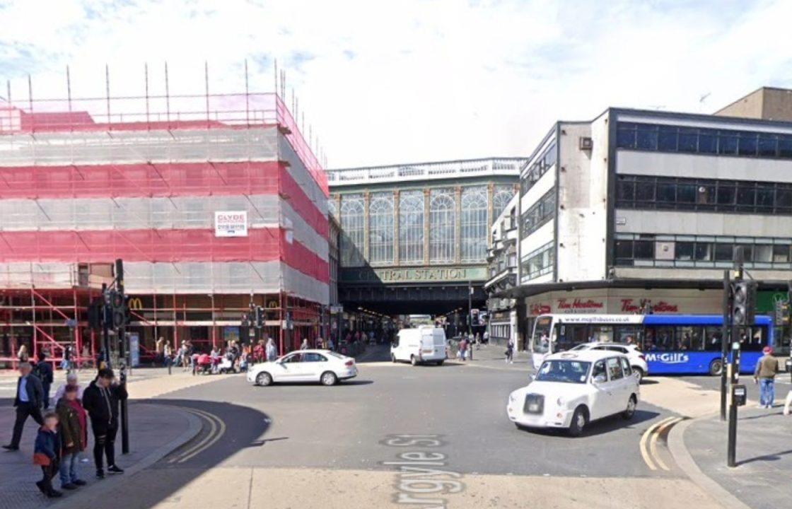 Man taken to hospital and another charged after crash in Glasgow city centre