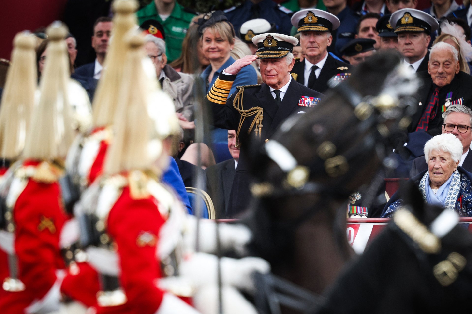 King Charles salutes members of the Household Cavalry.