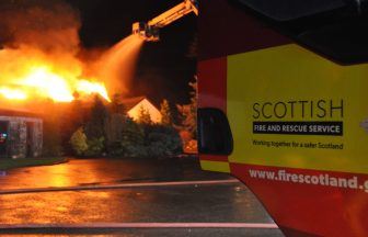 Crews battling wildfire equivalent to more than five football pitches in size
