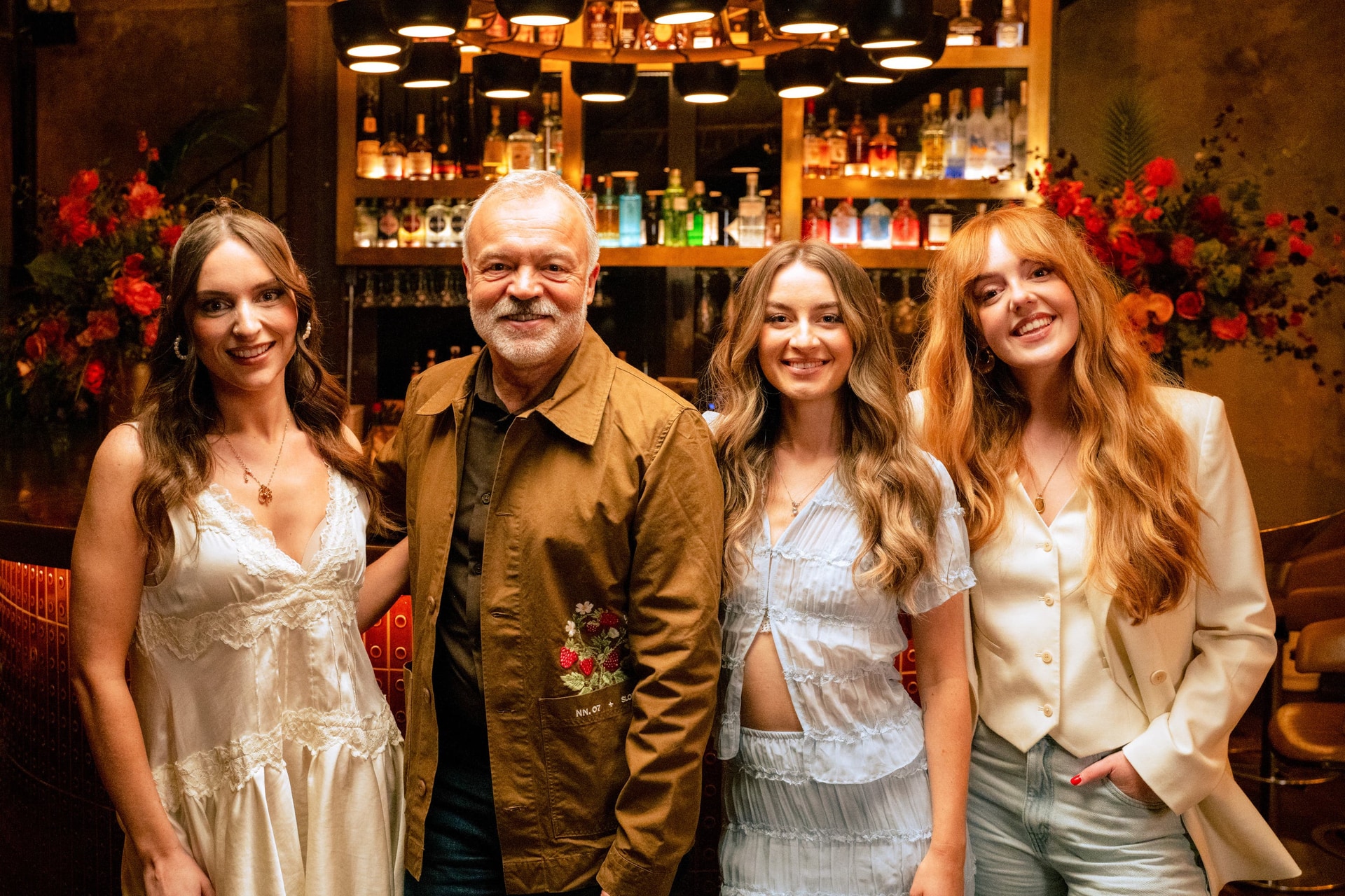 Graham Norton with Remember Monday, the UK’s Eurovision entry for this year (BBC Studios/Sam McMahon)