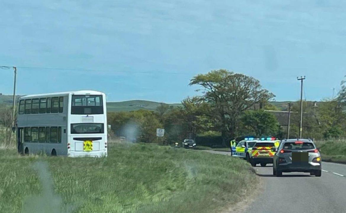 Double decker school bus veers off Aberdeenshire road due to medical incident on board