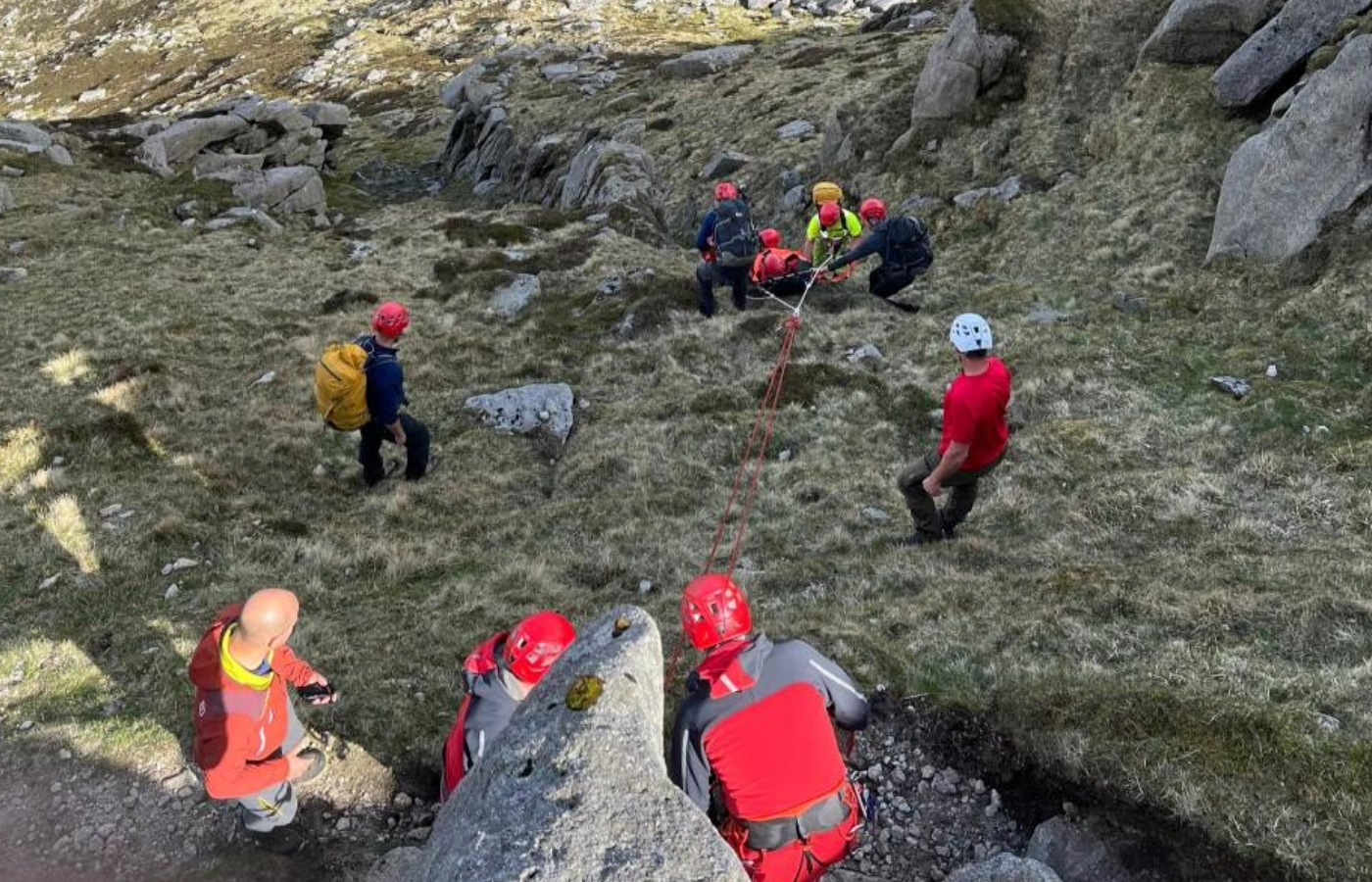 The hillwalker was packaged in a stretcher, and lowered to easier ground.