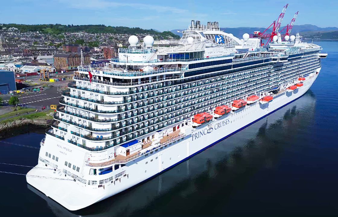 Massive cruise ship carrying more than 4,000 passengers docks at Scottish port