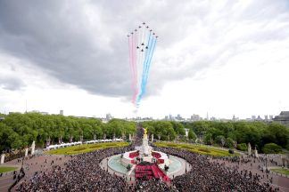 VE Day in pictures: Royals, Red Arrows flypast and crowds of thousands