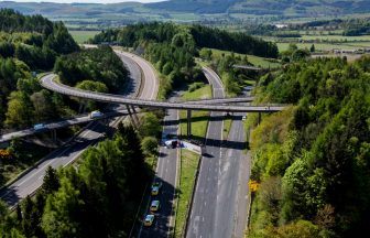 Driver fighting for life after lorry crashes off M90 motorway bridge in Perth
