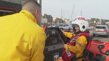 Schoolboy walking around town harbour to raise money for RNLI