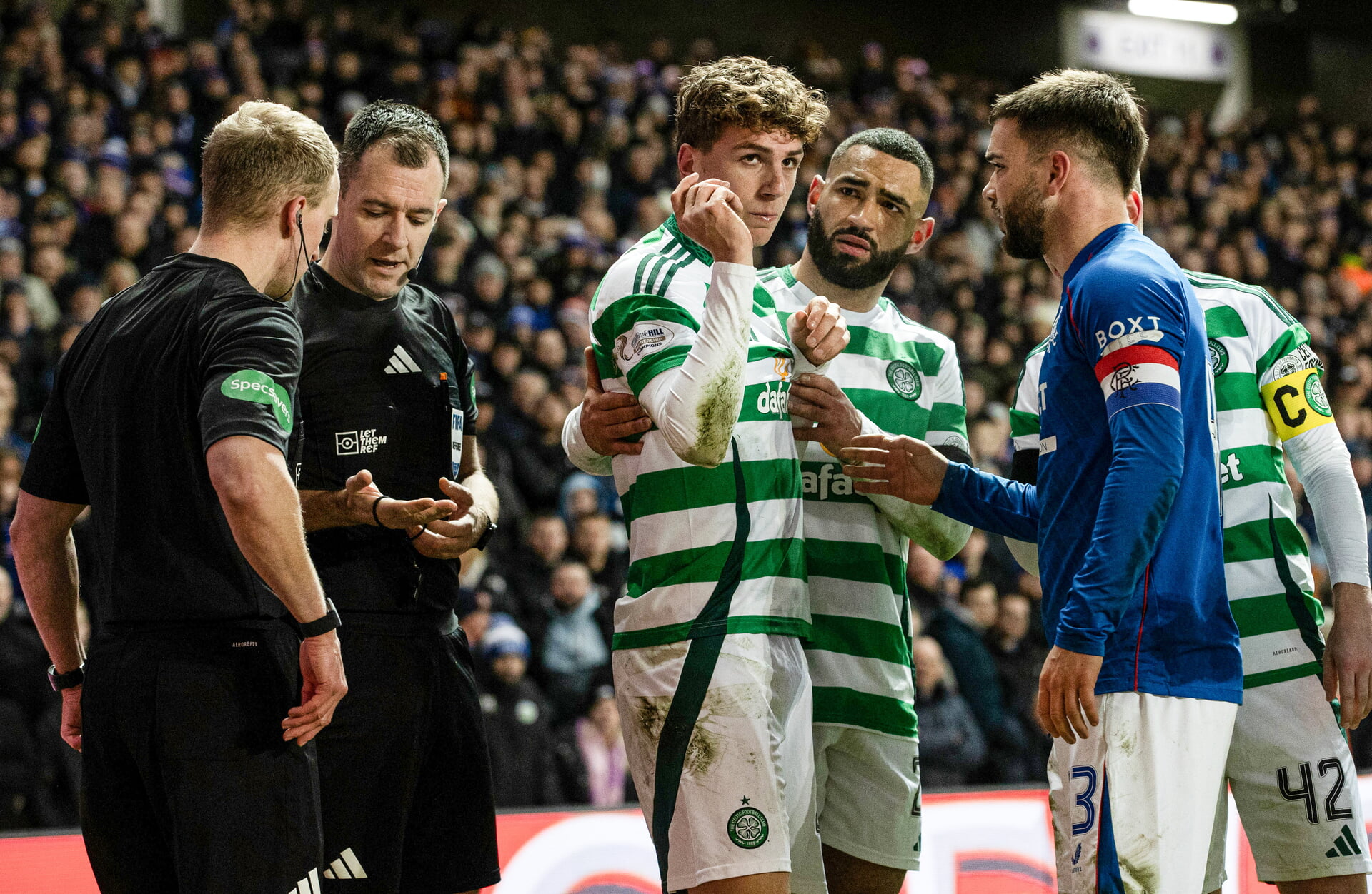 Celtic's Arne Engels was struck with a coin thrown by a Rangers fan during match between Rangers and Celtic at Ibrox Stadium, on January 2, 2025.