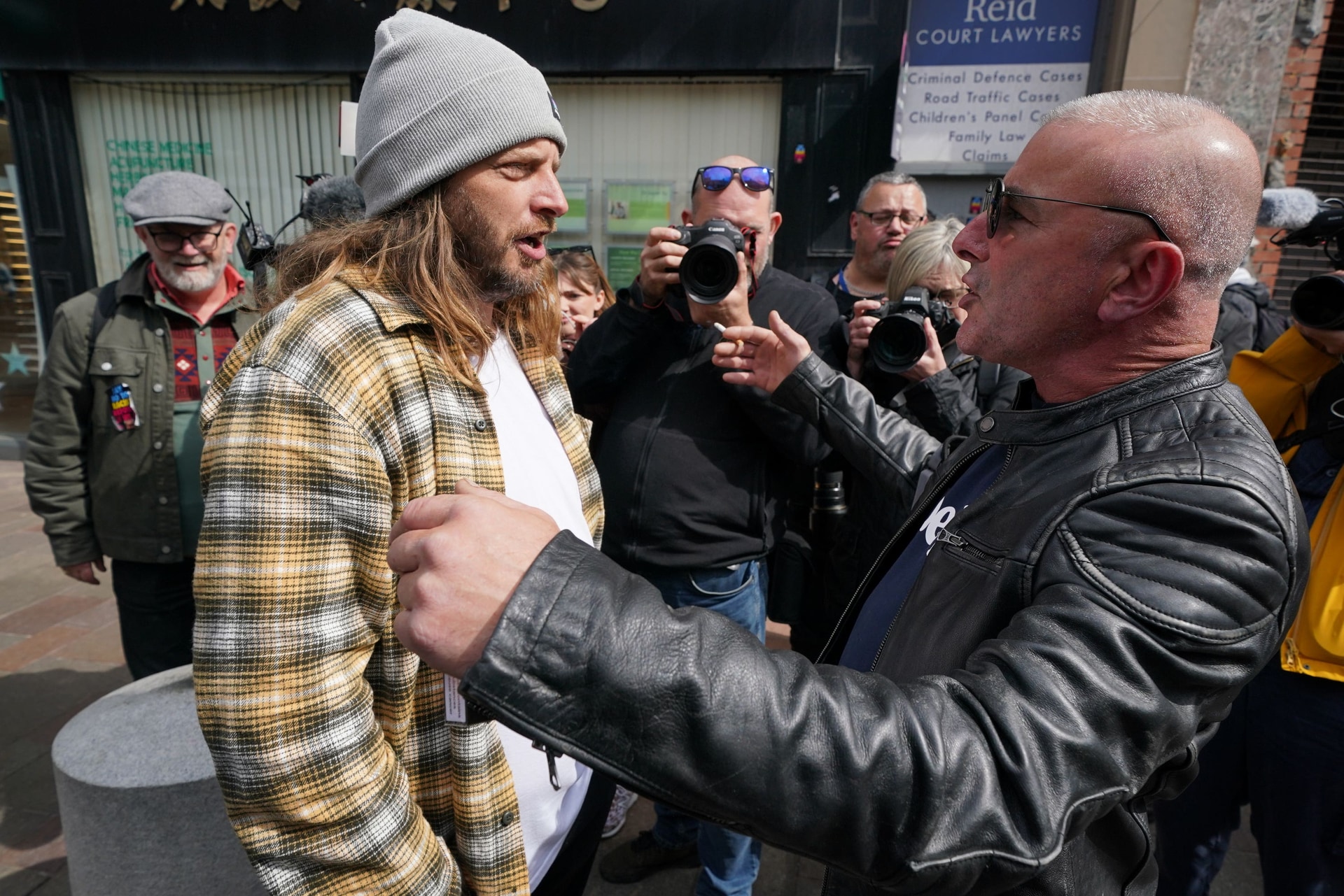 Demonstrators outside the Reform UK office in Hamilton, South Lanarkshire during a visit by party leader Nigel Farage (Jane Barlow/PA).
