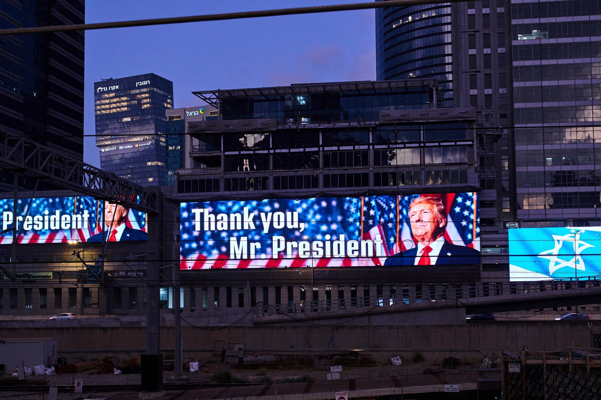 An electronic billboard beams an image of president Donald Trump alongside the message “Thank you, Mr. President” referring to the US involvement in the war between Israel and Iran (Bernat Armangue/AP).