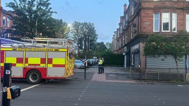 Man arrested and area taped off following disturbance in flat