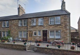 Police find person sleeping in cupboard under stairs during search of properties