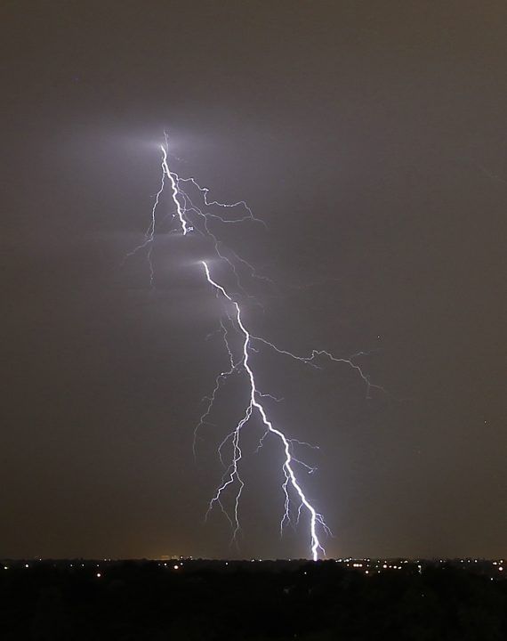 Lightning strike sets house on fire blocking road
