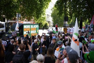 Kneecap ‘plasters’ London with message of support for group member due in court
