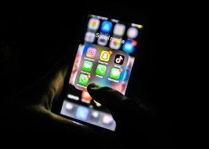 Government staff could be disciplined for using WhatsApp for work, MSPs told