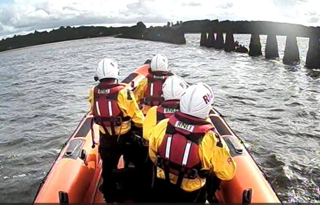 Two people and three dogs trapped in ‘waist-deep water’ rescued at Cramond Causeway