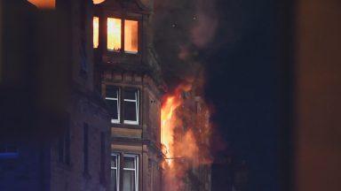 One dead and 50 families homeless after major flat fire