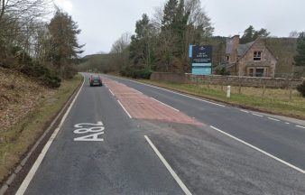 Teenager in serious condition after car crashes down embankment on A82