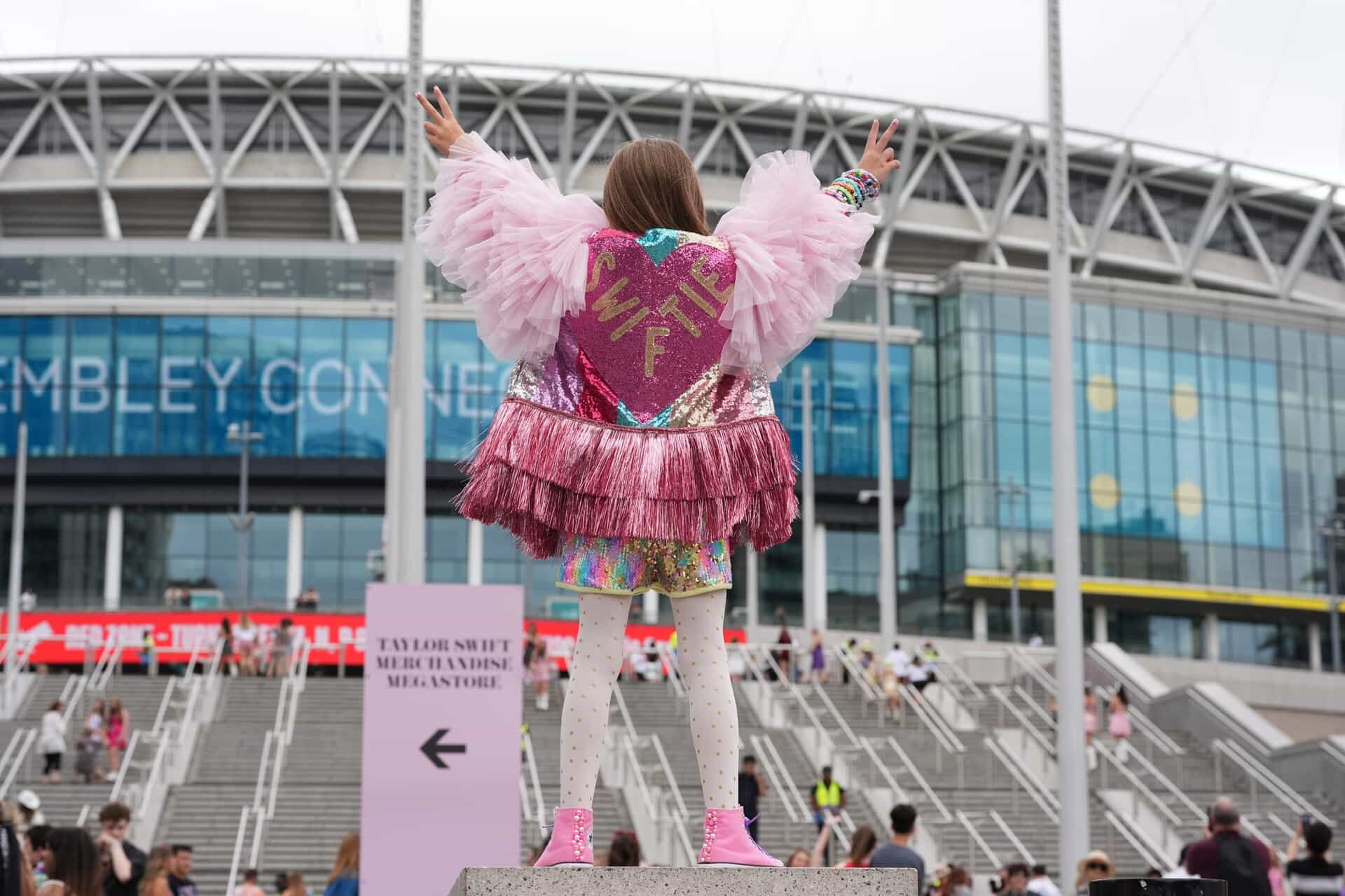 A young fan poses outside Wembley Stadium ahead of a concert (PA).