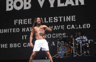 Glastonbury says chants by Bob Vylan ‘crossed the line’ as police assess footage