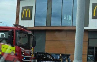 Driver taken to hospital after car crashes into McDonald’s drive-thru in Glasgow