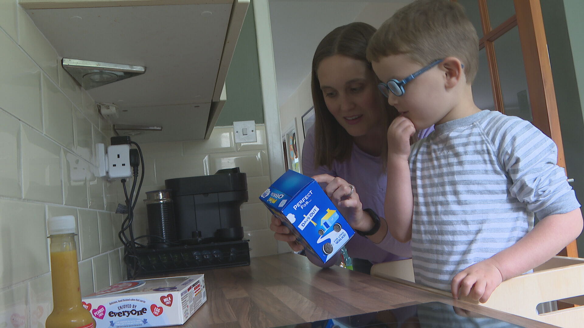 Heather checking ingredients with her son, Charlie.