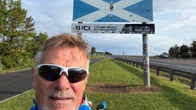 Retired banker hits halfway mark in bid to run 200 marathons around coast