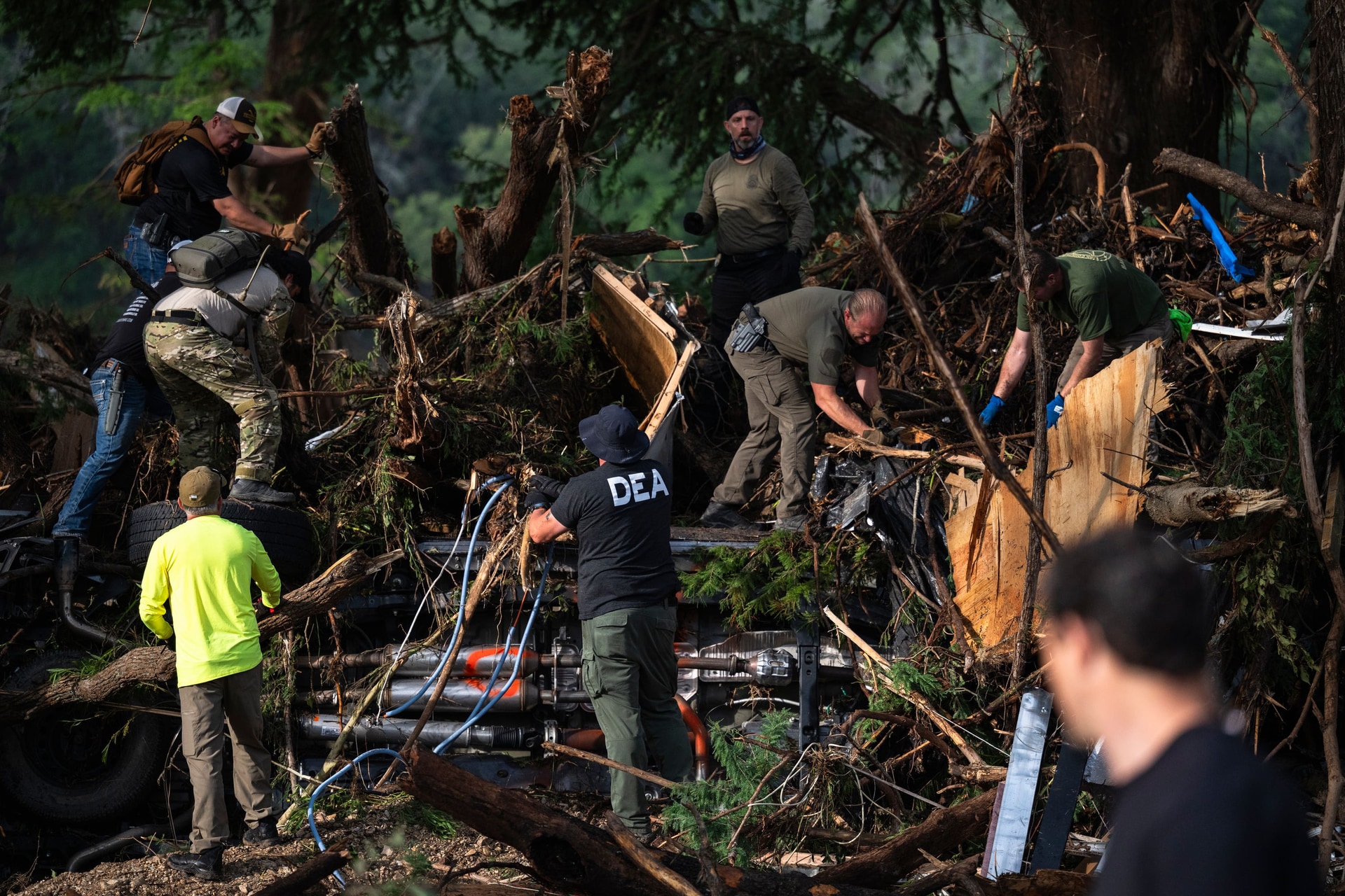 First responders carry out search and rescue operations near the Guadalupe River in Texas.