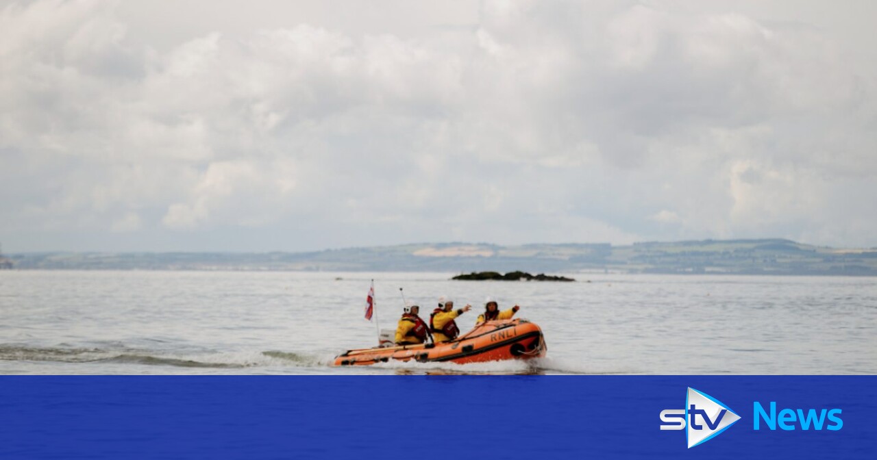 Swimmer rescued by lifeboat crews near Gullane after collapsing during ...