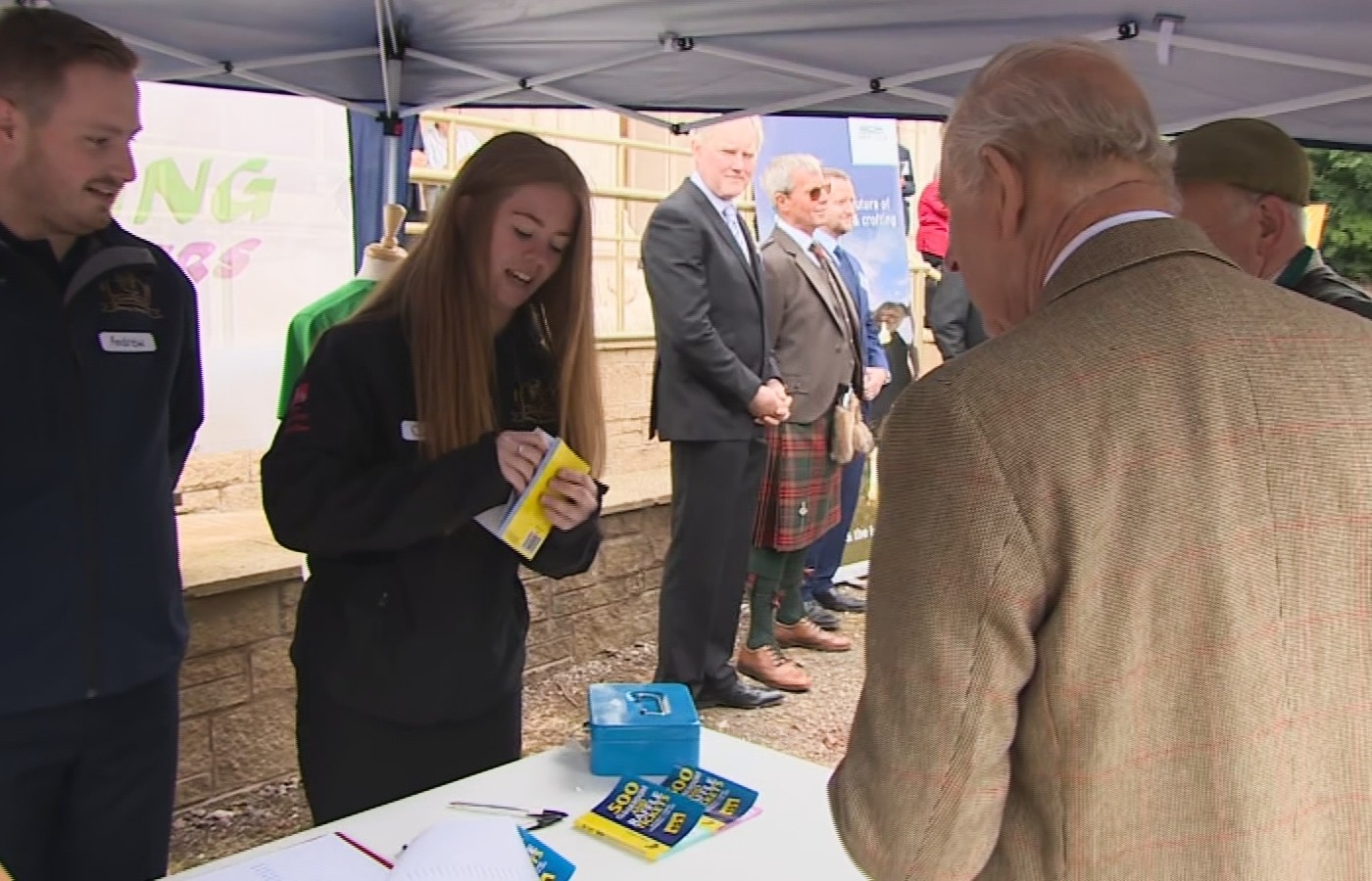 King Charles purchased a blue raffle ticket